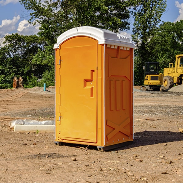 what is the cost difference between standard and deluxe portable restroom rentals in Morrill